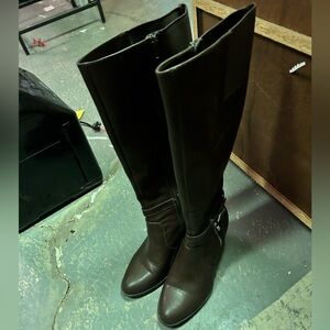 Tall brown leather boots